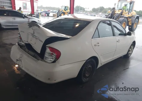 2003 Toyota Camry Le z USA, uszkodzony, nr VIN 4T1BE32KX3U146831